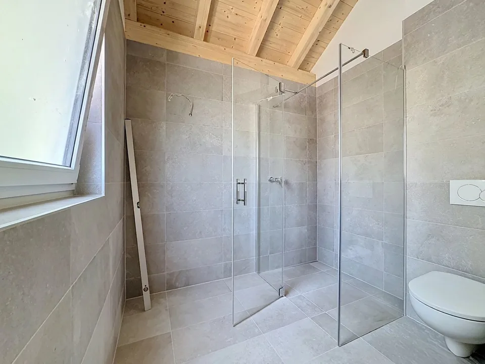 New 5.5-room apartment with private garden in Epinassey – photo 7 of 13