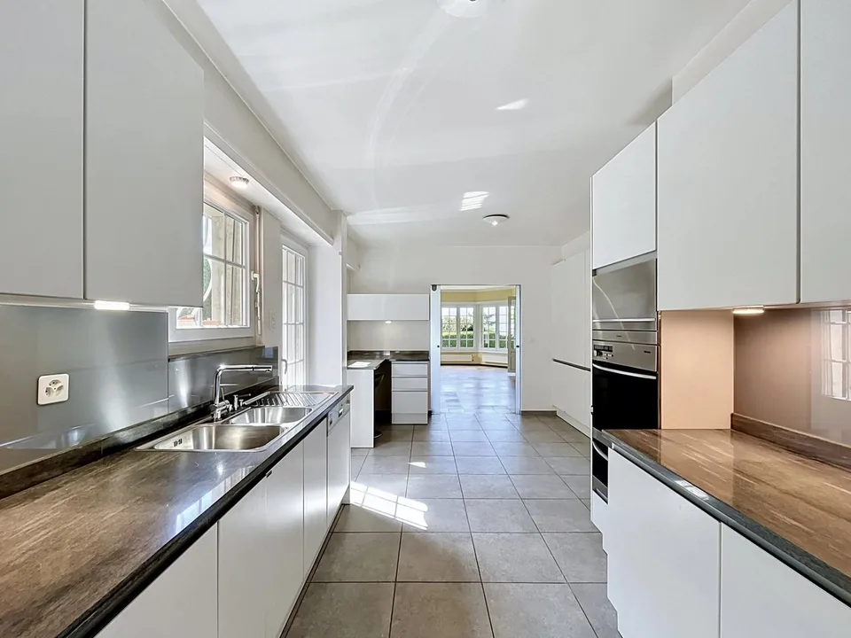 Casa in zona tranquilla con giardino e vista sul lago