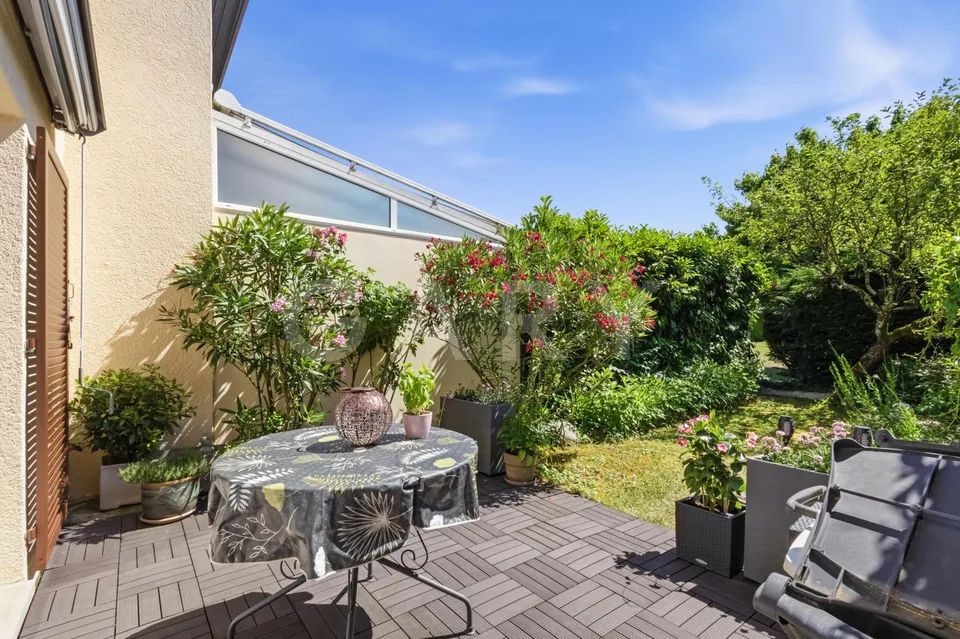 Maison familiale au sein d'une résidence privée