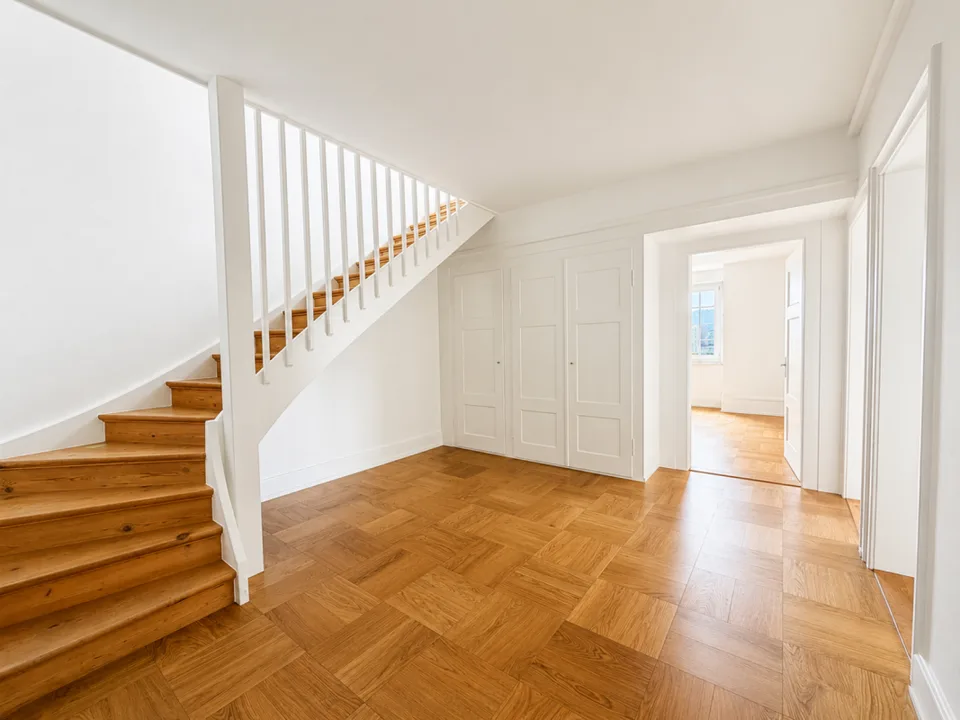 Exclusive maisonette apartment with a far-reaching view - stylish living above the roofs of Zurich! – photo 3 of 15