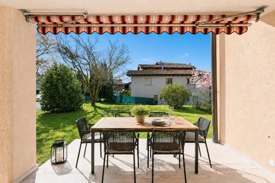 Luminoso Appartamento con Giardino Privato a Cureglia
