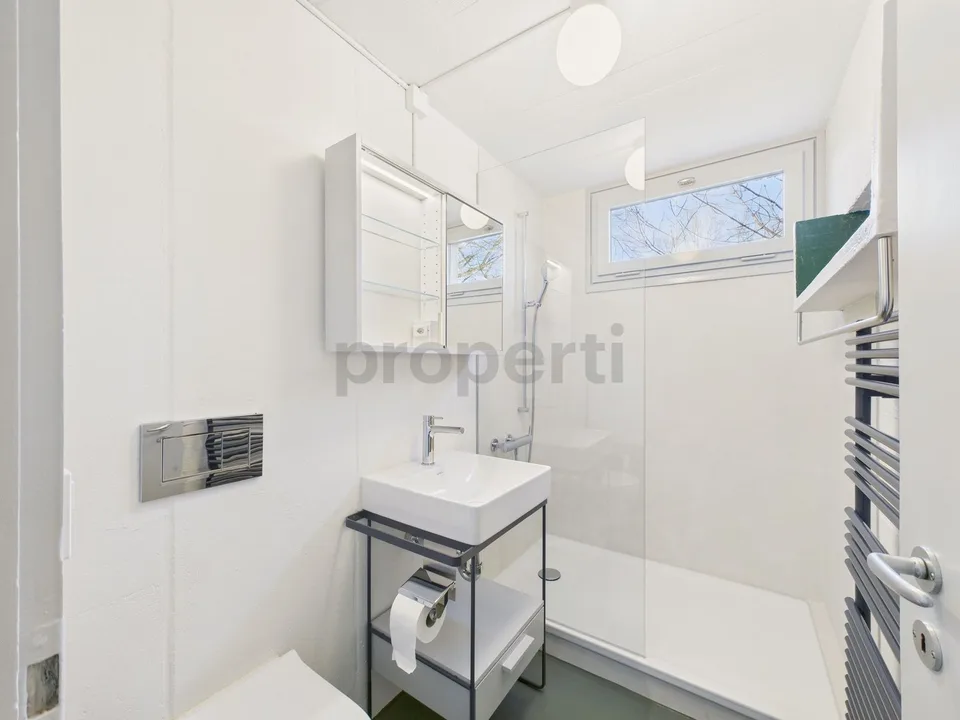 Wohnen in einer Ikone der Schweizer Architektur | Einzigartige Maisonettewohnung im denkmalgeschützten Atelier-5-Ensemble in Flamatt