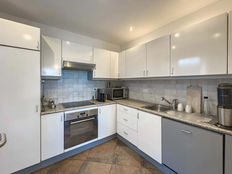 Appartement au dernier étage avec vue sur le lac à Paradiso, également disponible comme résidence secondaire