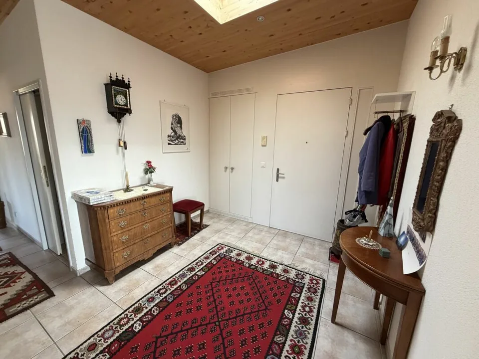 Appartamento in mansarda, garage, vano cantina