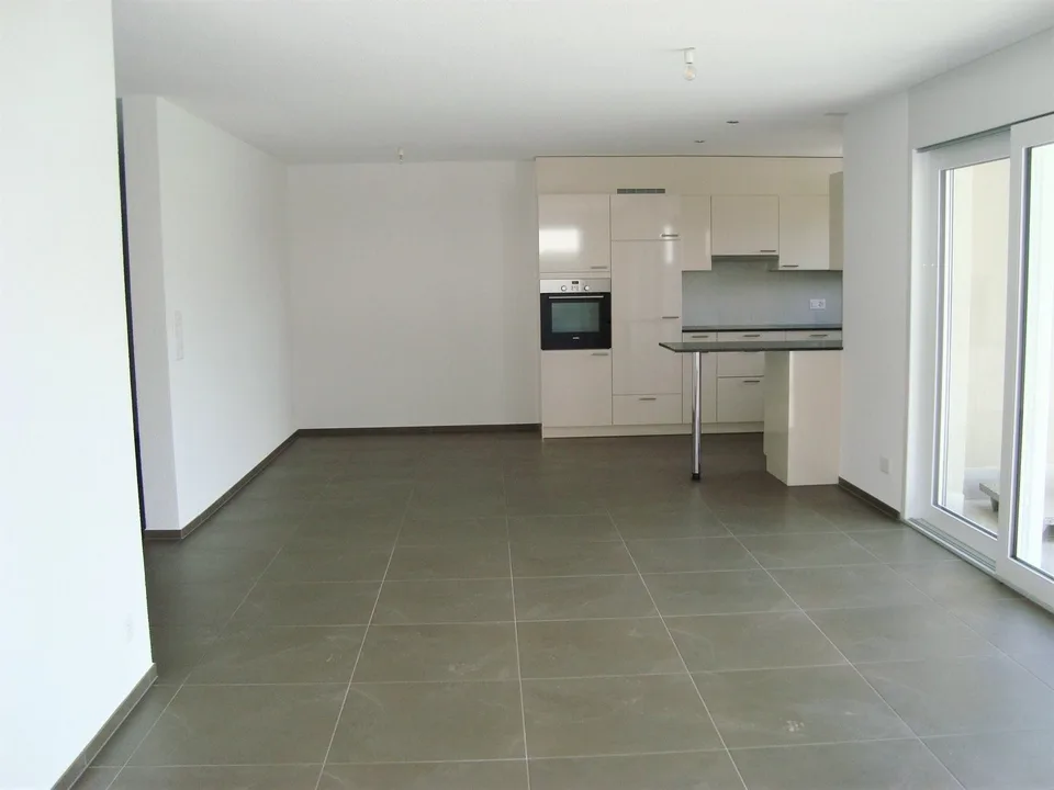 Moderne Attikawohnung mit sonniger Terrasse und Blick ins Grüne