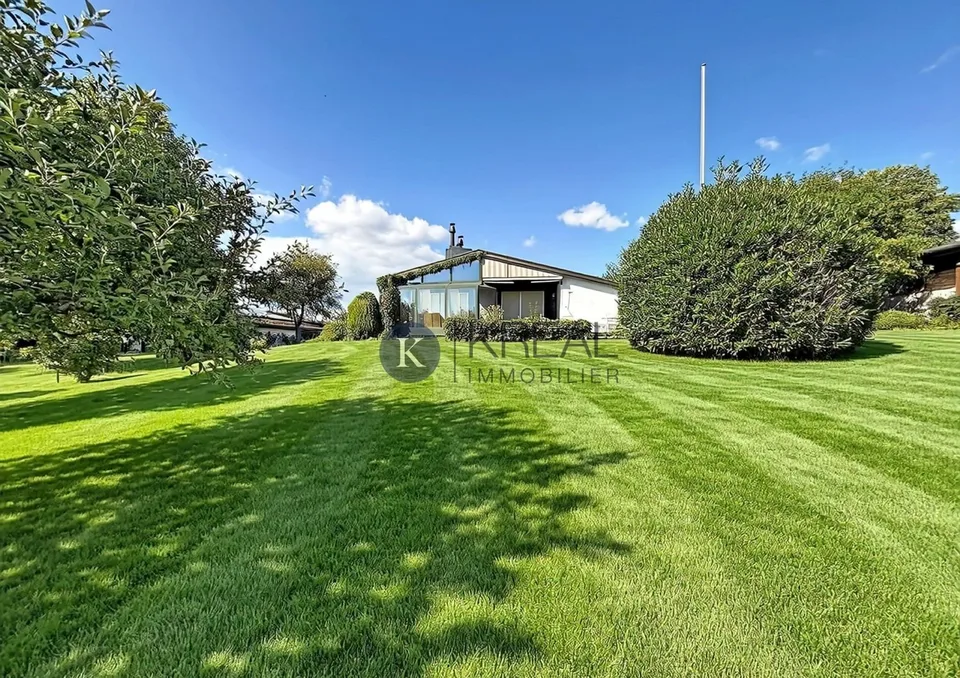 Einzelhaus mit 4.5 Zimmern und Garten