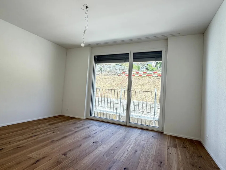 Appartamento di 4,5 locali nuovo al 1° piano con parcheggio sotterraneo – foto 8 di 13