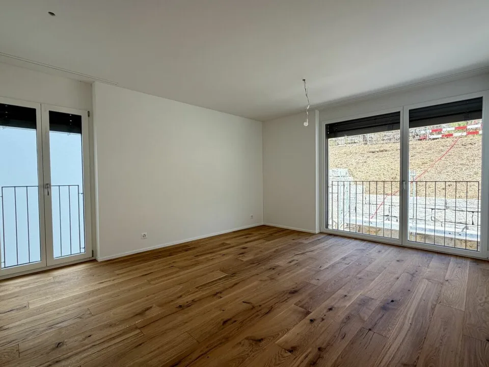 Appartamento di 4,5 locali nuovo al 1° piano con parcheggio sotterraneo – foto 7 di 13