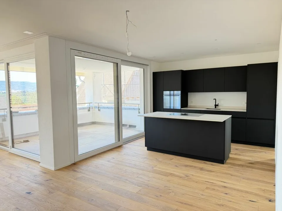 Neubau 4.5 Zimmer-Wohnung im 1. OG mit Tiefgarage