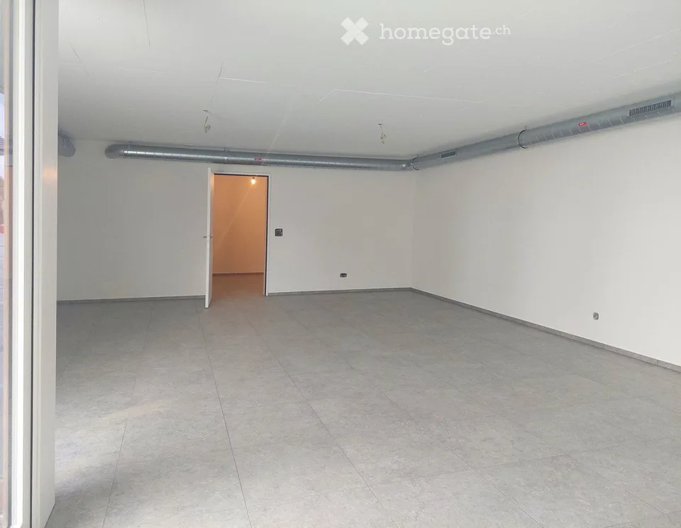 Espace commercial moderne dans un immeuble neuf, polyvalent et idéalement situé