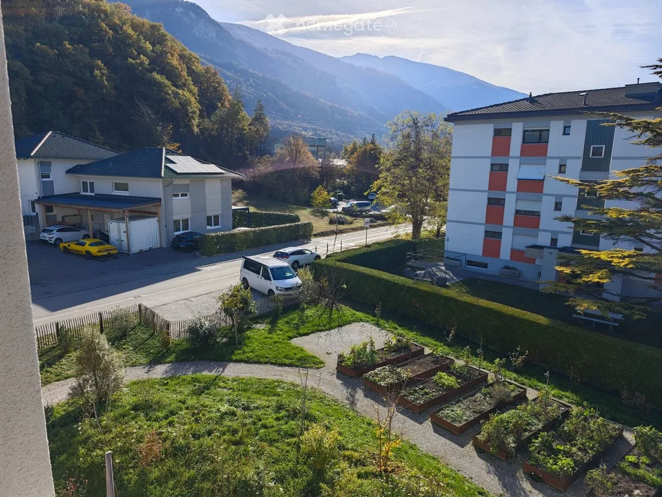 Moderne 2,5-Zimmer-Wohnung mit Terrasse und 2 Parkplätzen