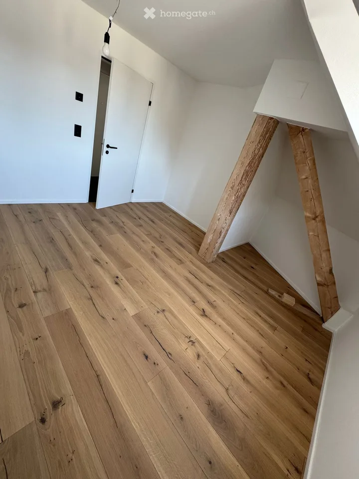 Appartamento mansardato di 4,5 locali completamente ristrutturato con balcone