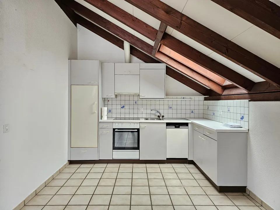 3.5-Room-Balcony-Attic Apartment in a Green Setting!
