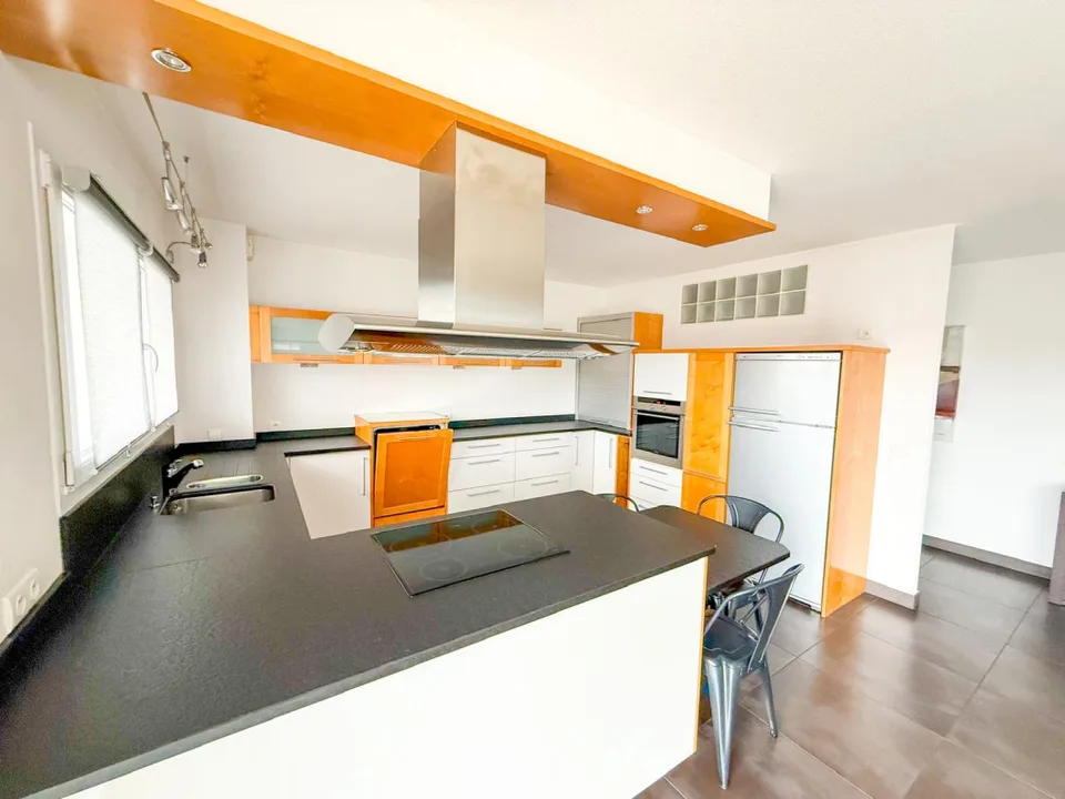 In France, Village-Neuf: The 4-Piece Premium Apartment with Unique Features