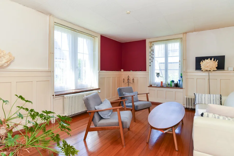Maison de trois familles dans un bon emplacement à Buchs avec environnement bien entretenu