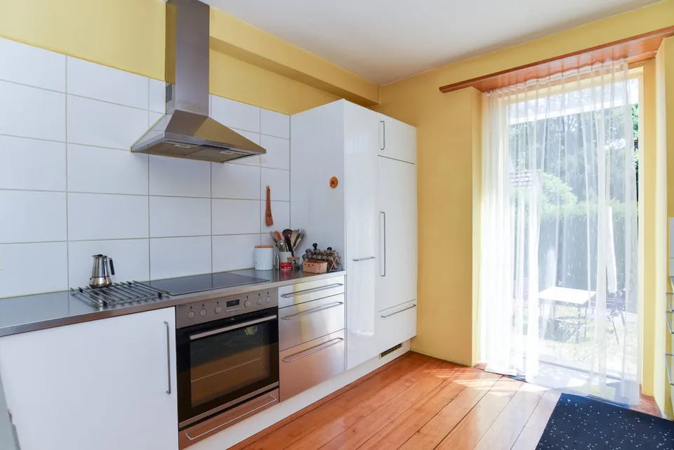 Maison de trois familles dans un bon emplacement à Buchs avec environnement bien entretenu
