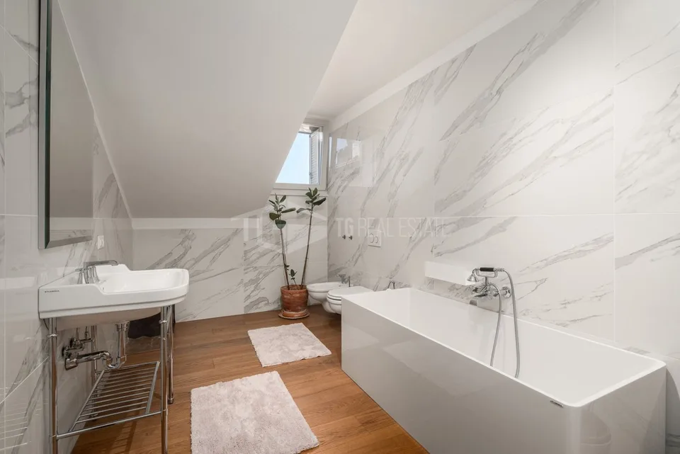 LUXUS UND KOMFORT: 6,5 ZIMMER PENTHOUSE-WOHNUNG MIT PANORAMABLICK AUF LUGANO – Foto 6 von 14
