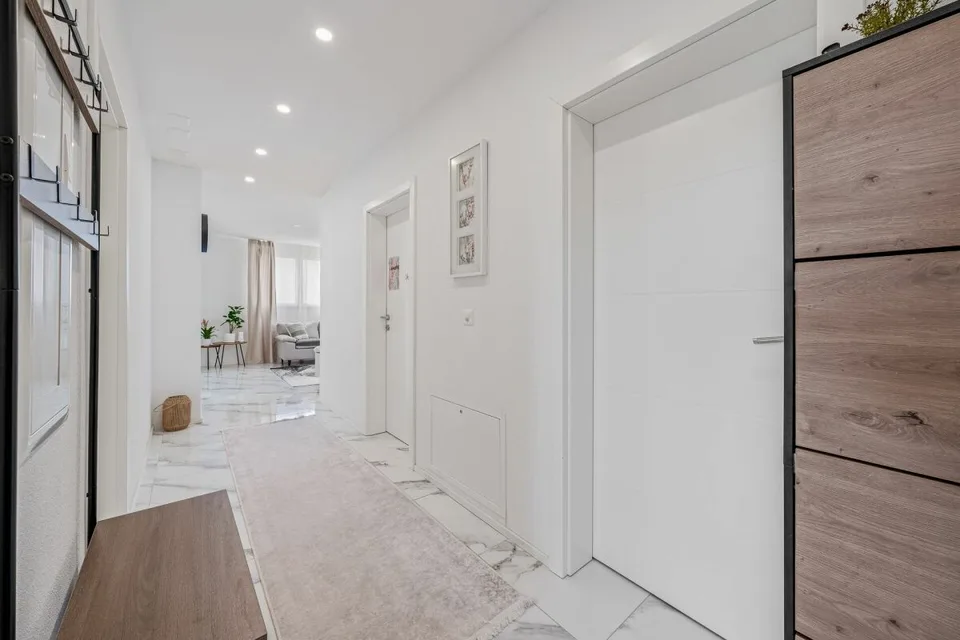 Casa familiare completamente ristrutturata con un potenziale di rendita attraente