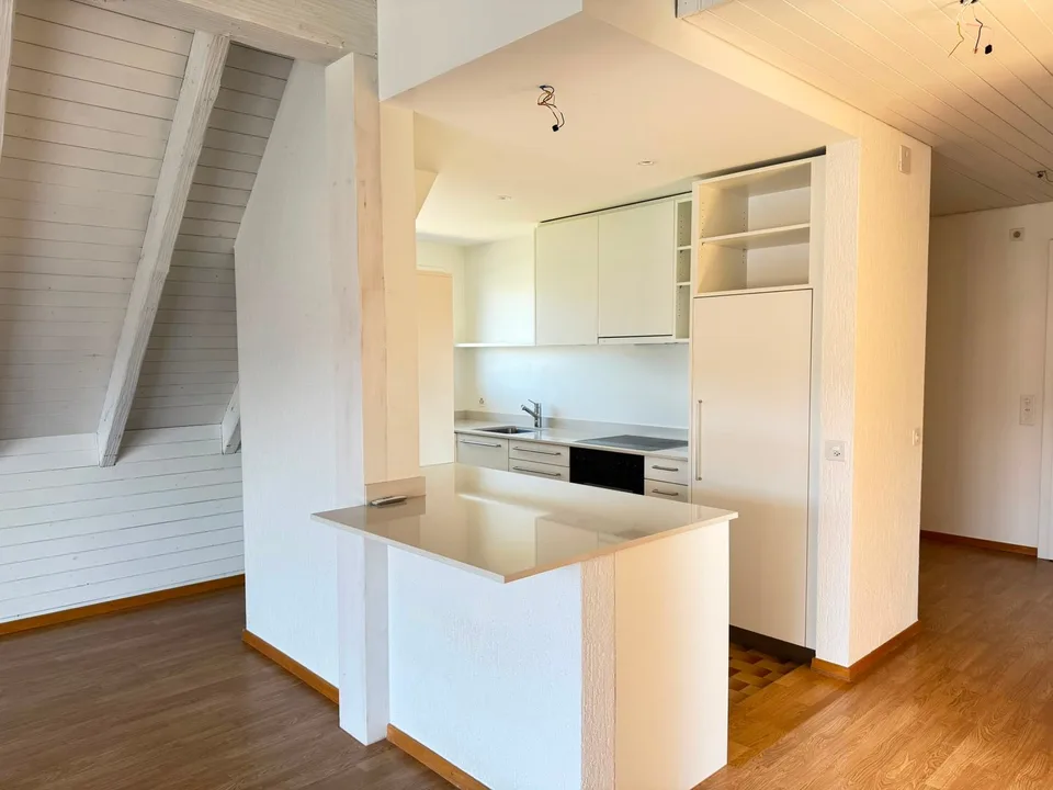 Dachwohnung an ruhiger Lage im Dorfzentrum