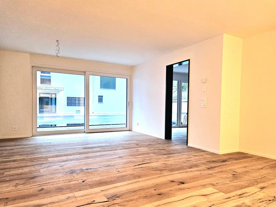 Appartamento moderno di 2,5 locali al piano terra "Neubau"
