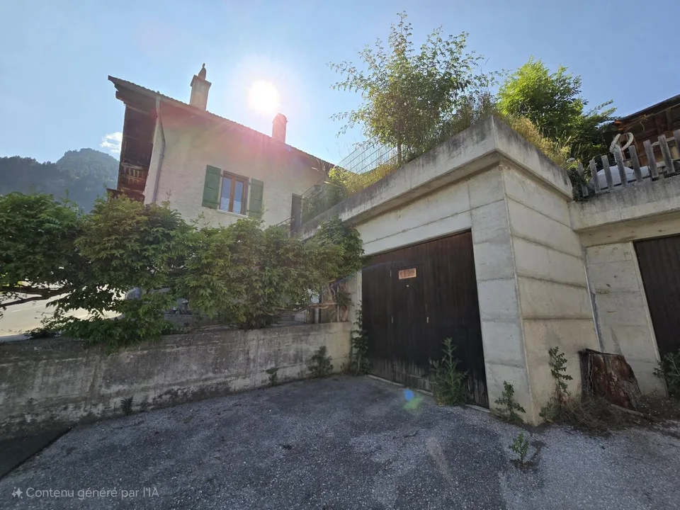 Casa a schiera di 3.5 locali / giardino, cantina e Garage Box inclusi