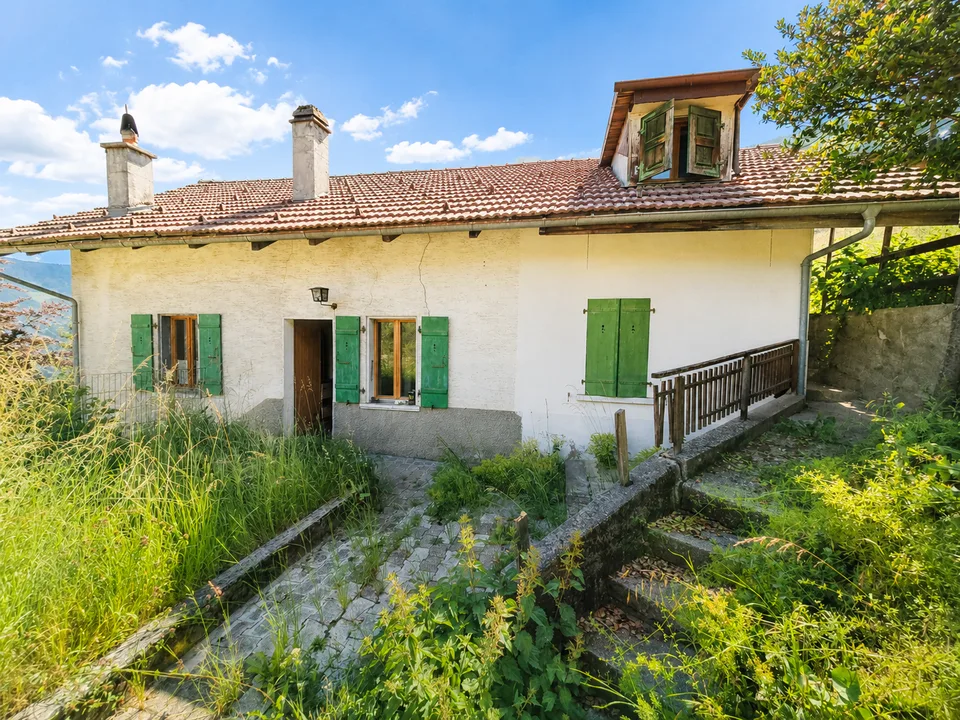 Casa a schiera di 3.5 locali / giardino, cantina e Garage Box inclusi