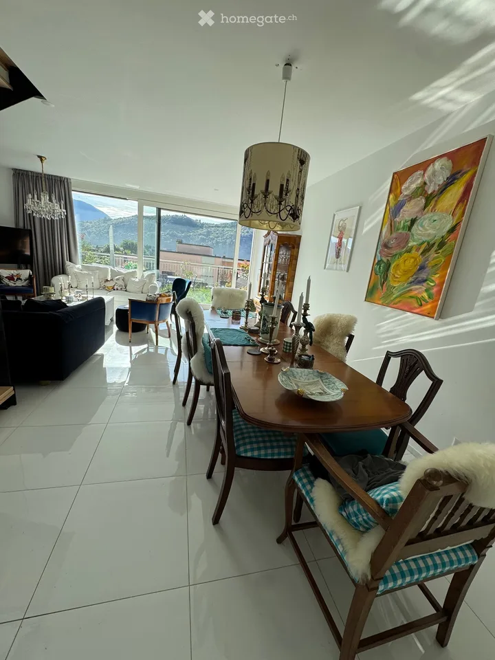Modern 4.5-room semi-detached house with mountain view in Agno