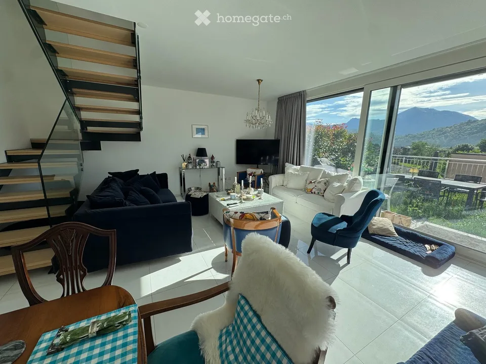 Modern 4.5-room semi-detached house with mountain view in Agno