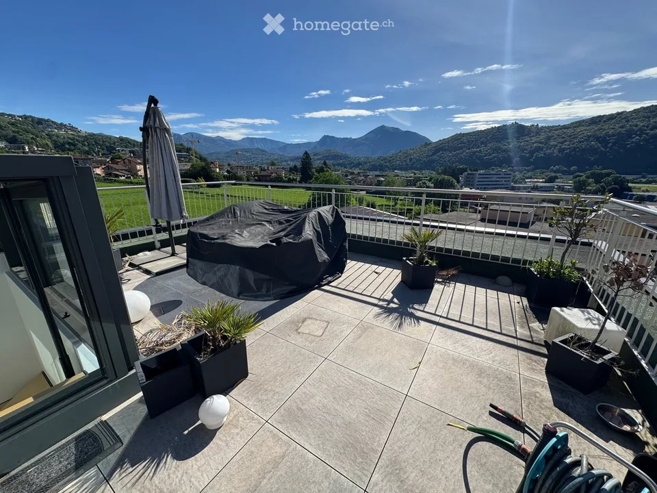 Moderne 4.5-Zimmer-Doppelhaushaelfte mit Bergblick in Agno