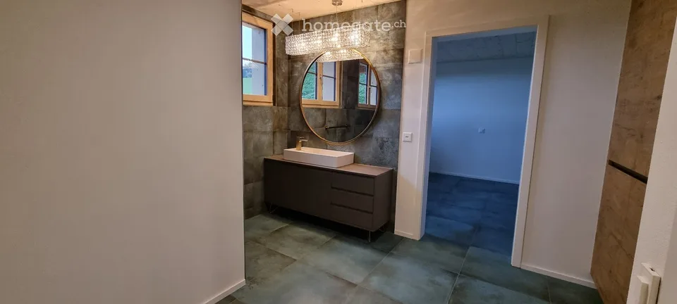 Appartement maisonnette moderne 3.5 pièces dans un environnement unique avec un petit revenu complémentaire