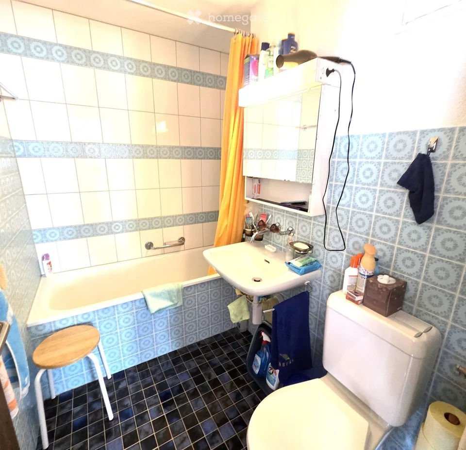 Incantevole appartamento di 2,5 locali con posto giardino, garage singolo e vista montagna a Wildhaus