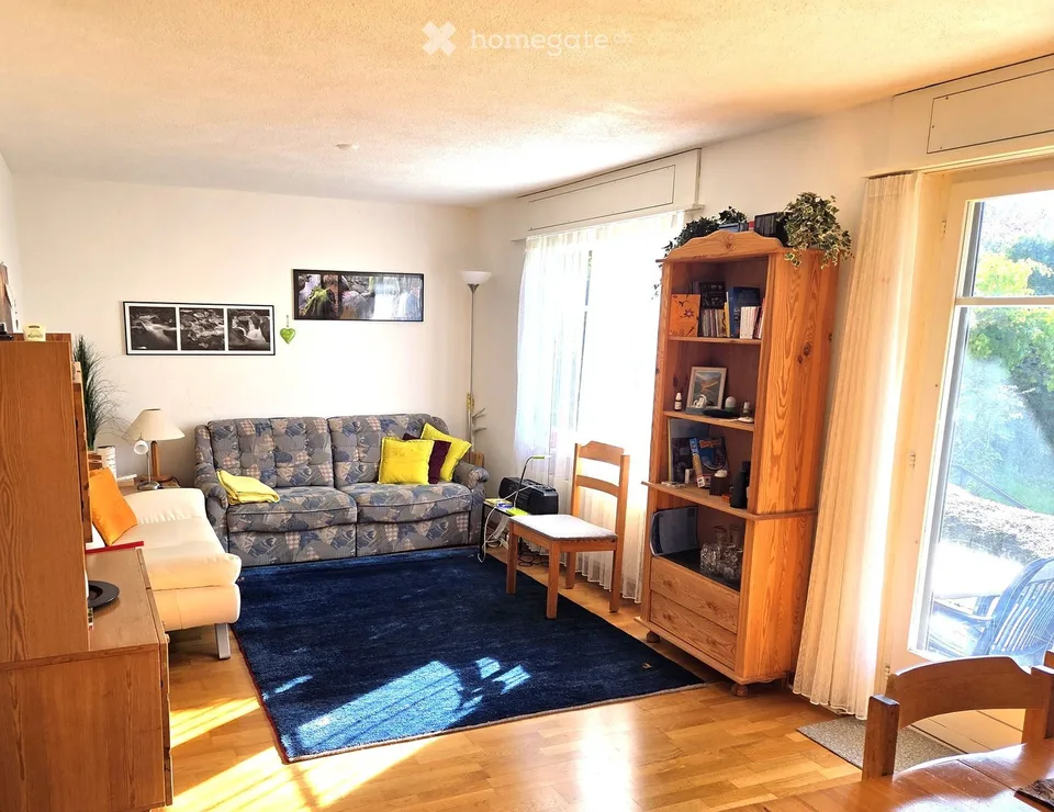 Incantevole appartamento di 2,5 locali con posto giardino, garage singolo e vista montagna a Wildhaus