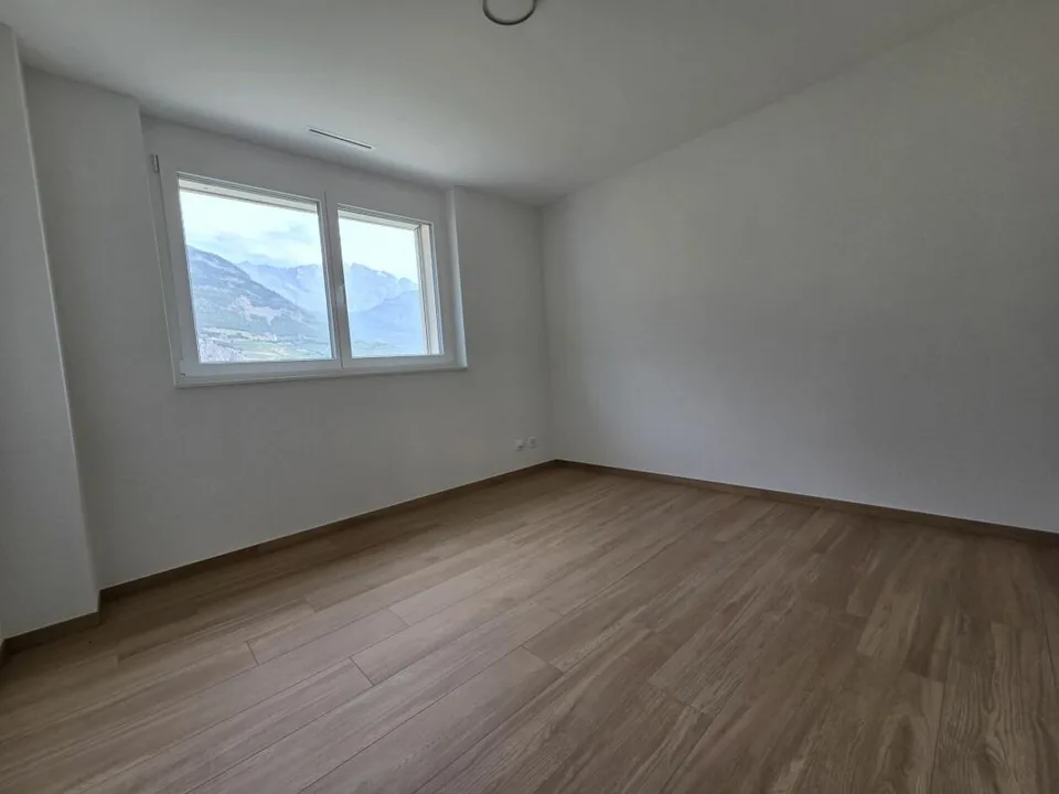 Nuovo - Appartamento di 3.5 locali con balcone e posti auto