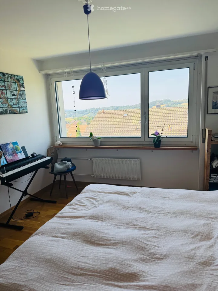 Charming 2.5-room apartment in Bonstetten with balcony and beautiful views