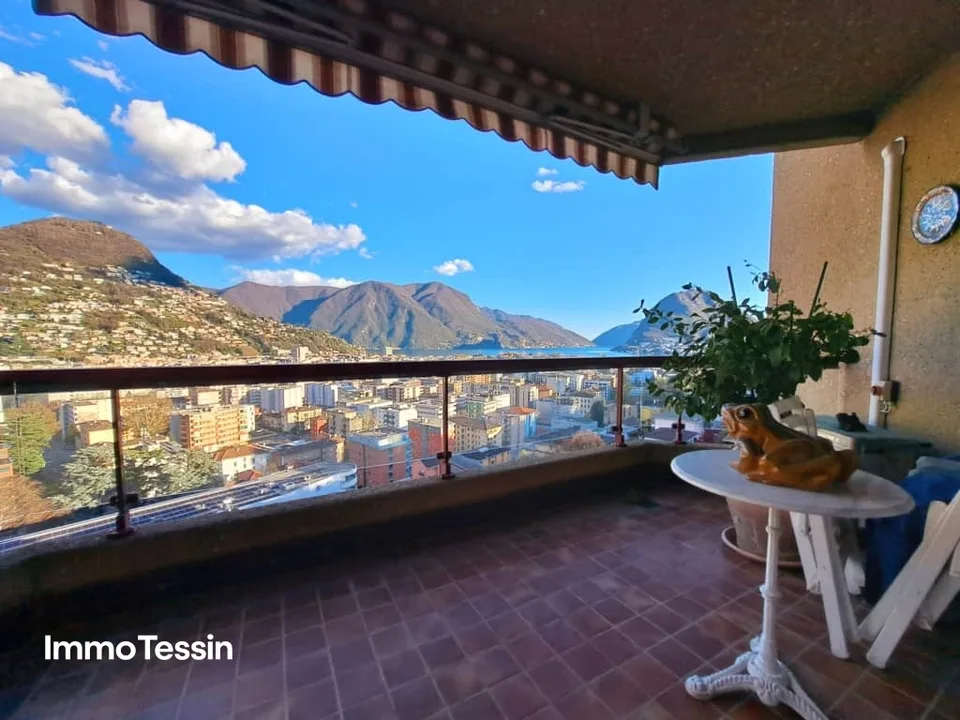 GELEGENHEIT: Luxuswohnung an top Lage mit Pool & Seesicht über Lugano auf den Lago Lugano