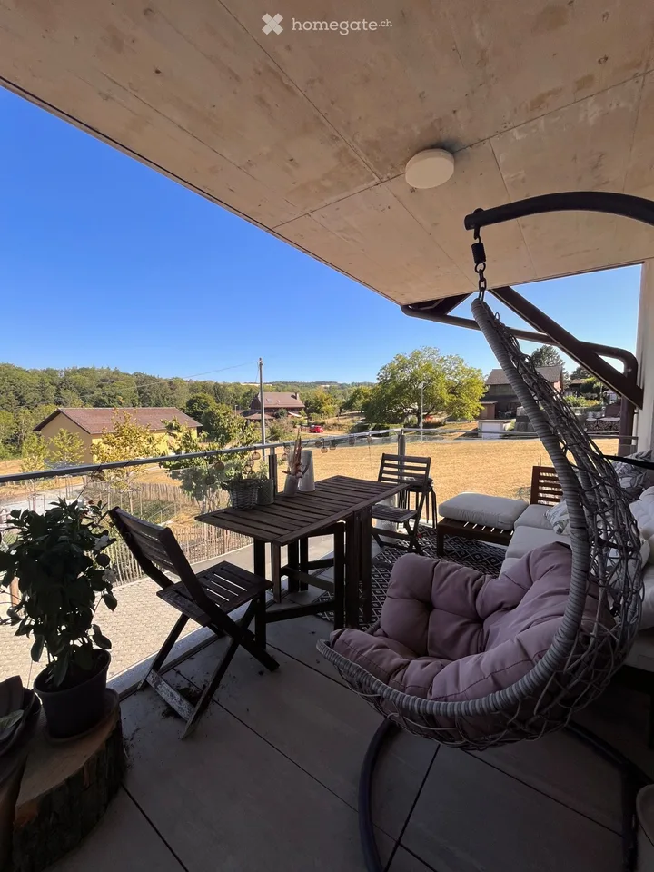 Appartement de 4.5 pièces avec balcon et jardin