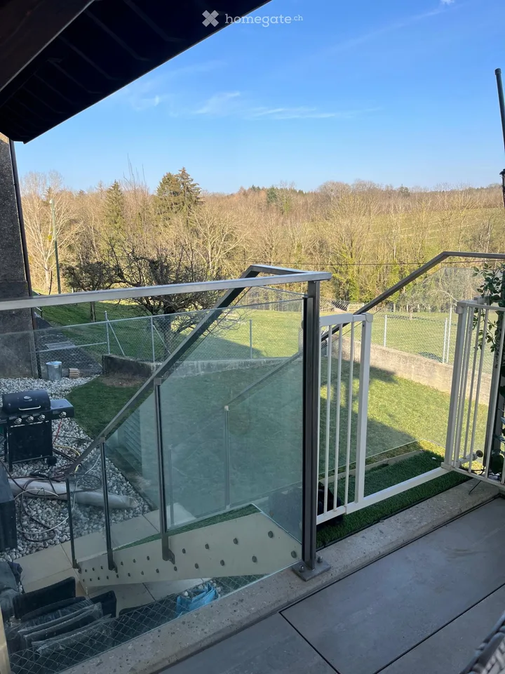 Appartement de 4.5 pièces avec balcon et jardin