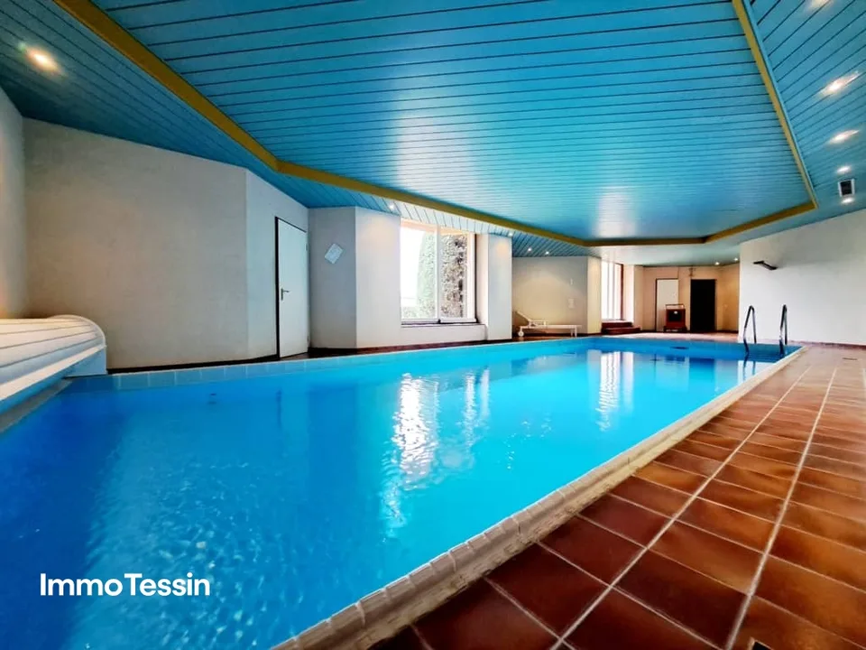 GELEGENHEIT: Luxuswohnung an top Lage mit Pool & Seesicht über Lugano auf den Lago Lugano
