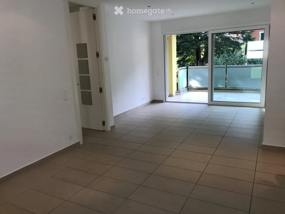 À louer à Melide Appartement lumineux de 4 pièces