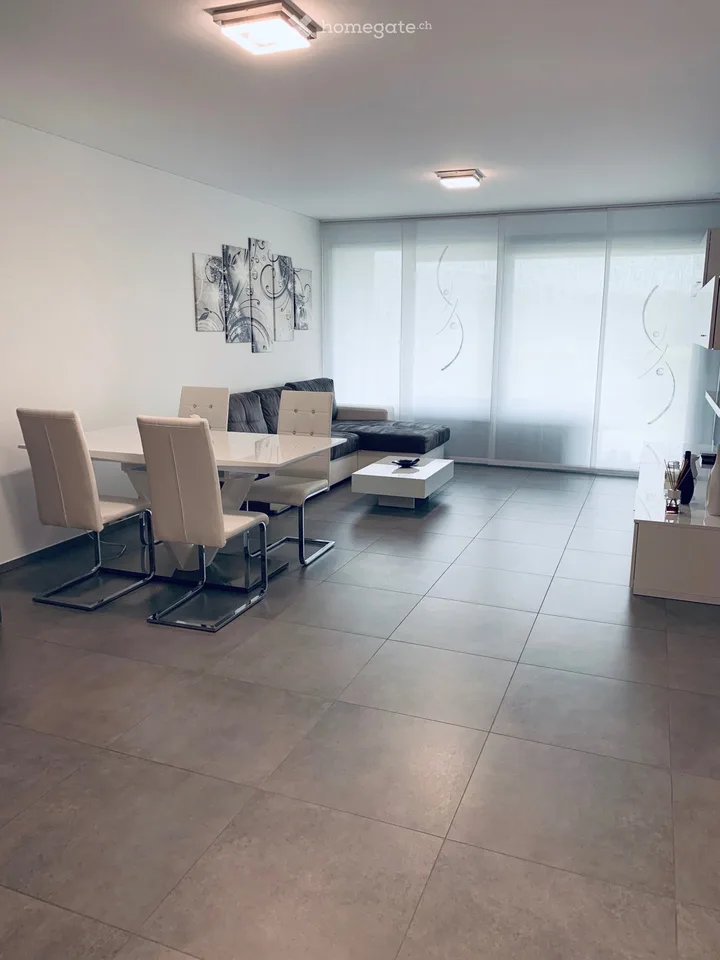 GRAVESANO: appartement moderne 2.5 pièces avec jardin privé