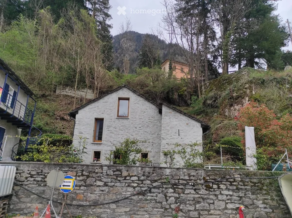Casa di 2.5 locali con giardino e posteggio