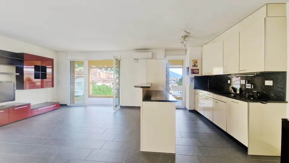 Bellissimo 3,5 in zona residenziale con terrazza coperta panoramica.