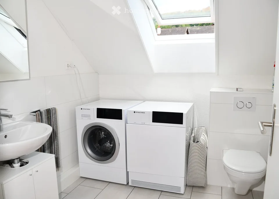 Charmant appartement de 3,5 pièces mansardé à Büsserach – moderne et calme