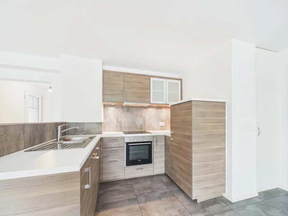 Appartement de 2.5 pièces au RDC avec jardin à Villeneuve