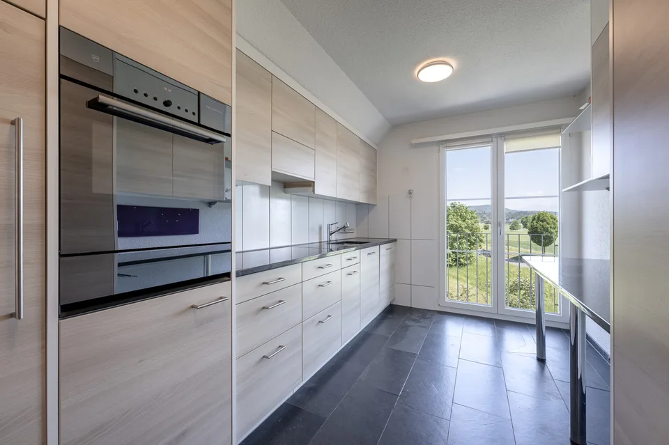 Habitation spacieuse : appartement maisonnette avec vue sur le vert
