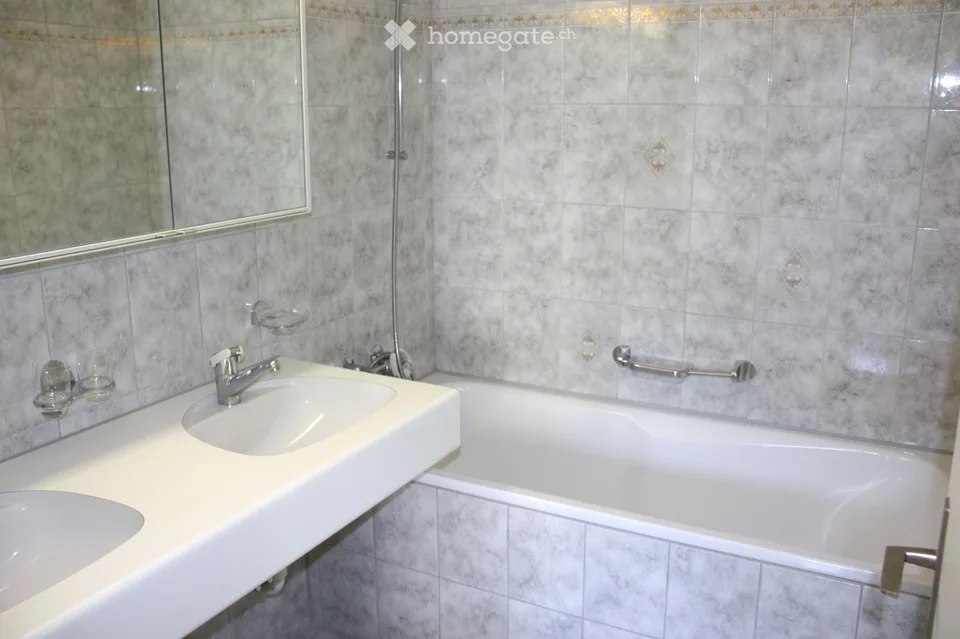 Charmant appartement 2.5 pièces au 2ème étage avec balcon dans un emplacement très calme