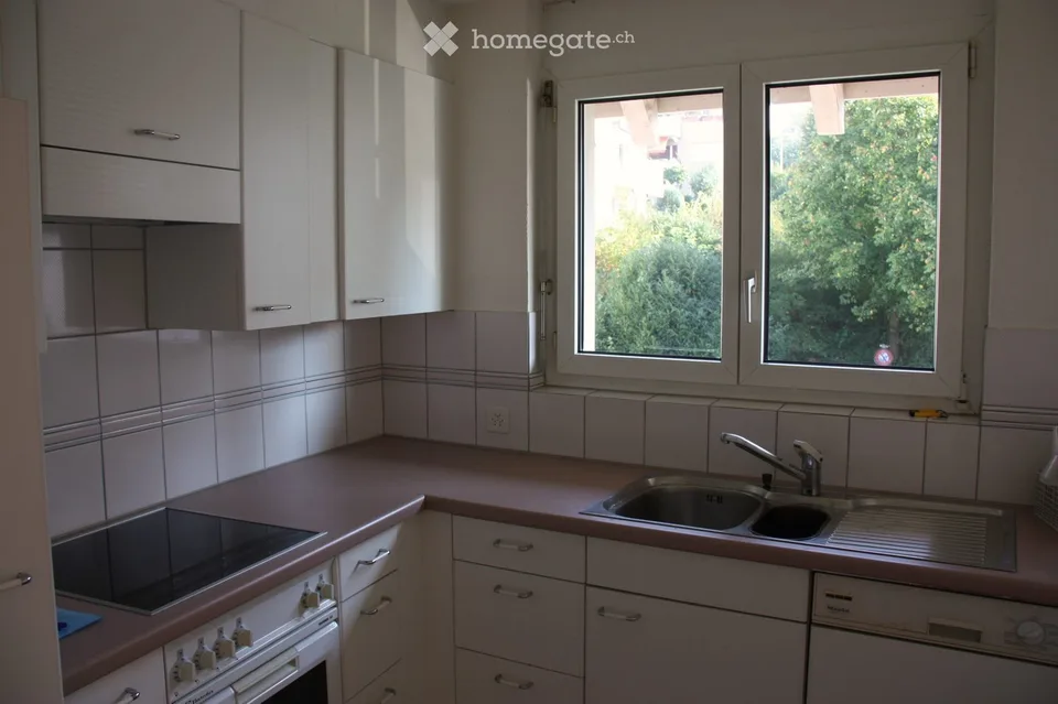 Charmant appartement 2.5 pièces au 2ème étage avec balcon dans un emplacement très calme