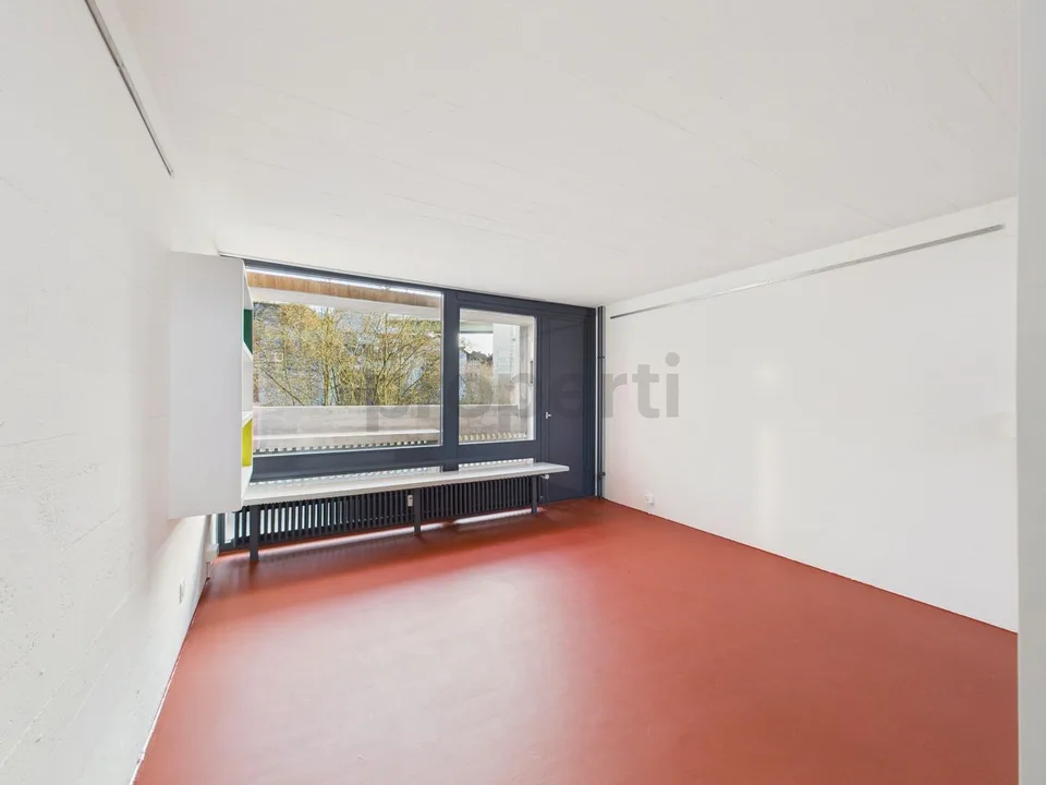 Vivere in un'icona dell'architettura svizzeraAppartamento maisonnette unico nell'ensemble Atelier-5 vincolato a Flamatt