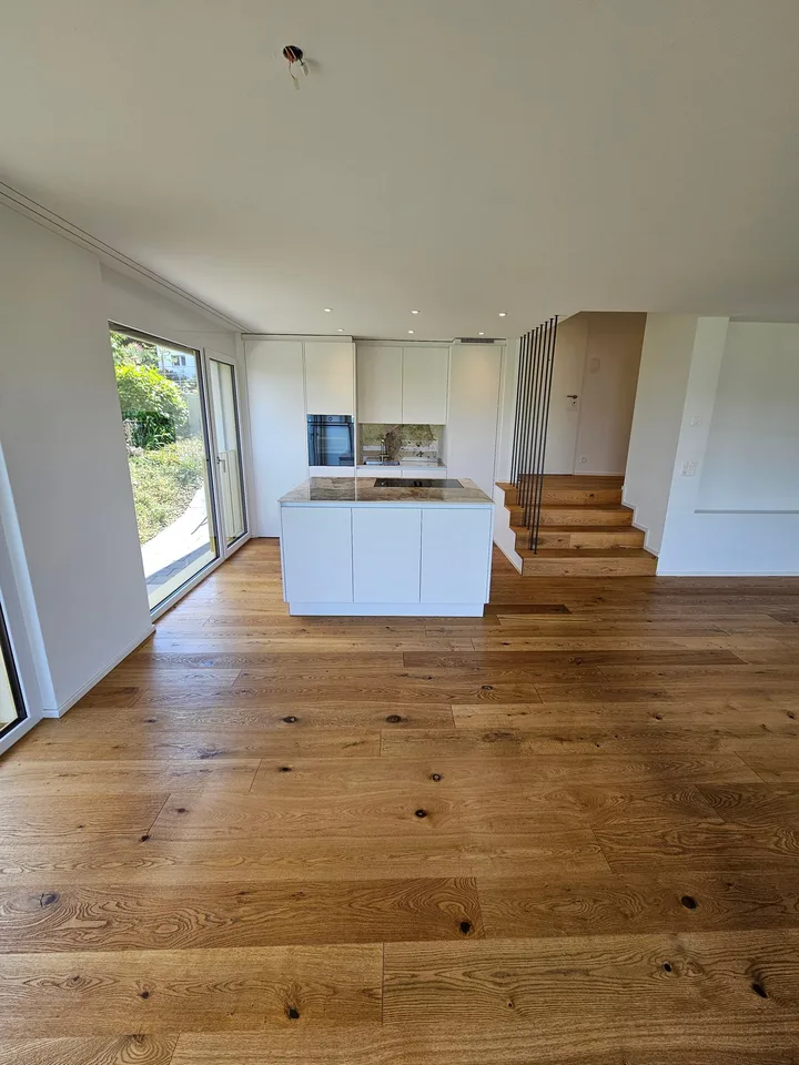 Exclusive 4.5-room apartment with garden seating and panoramic views