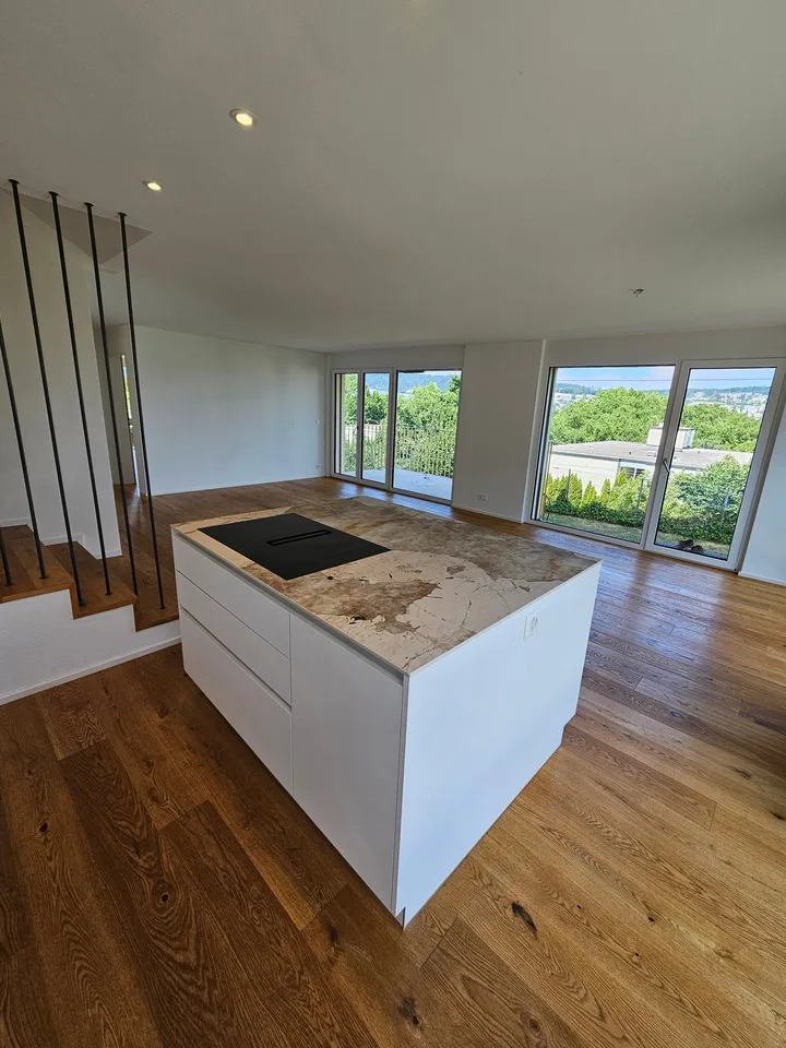 Exclusive 4.5-room apartment with garden seating and panoramic views
